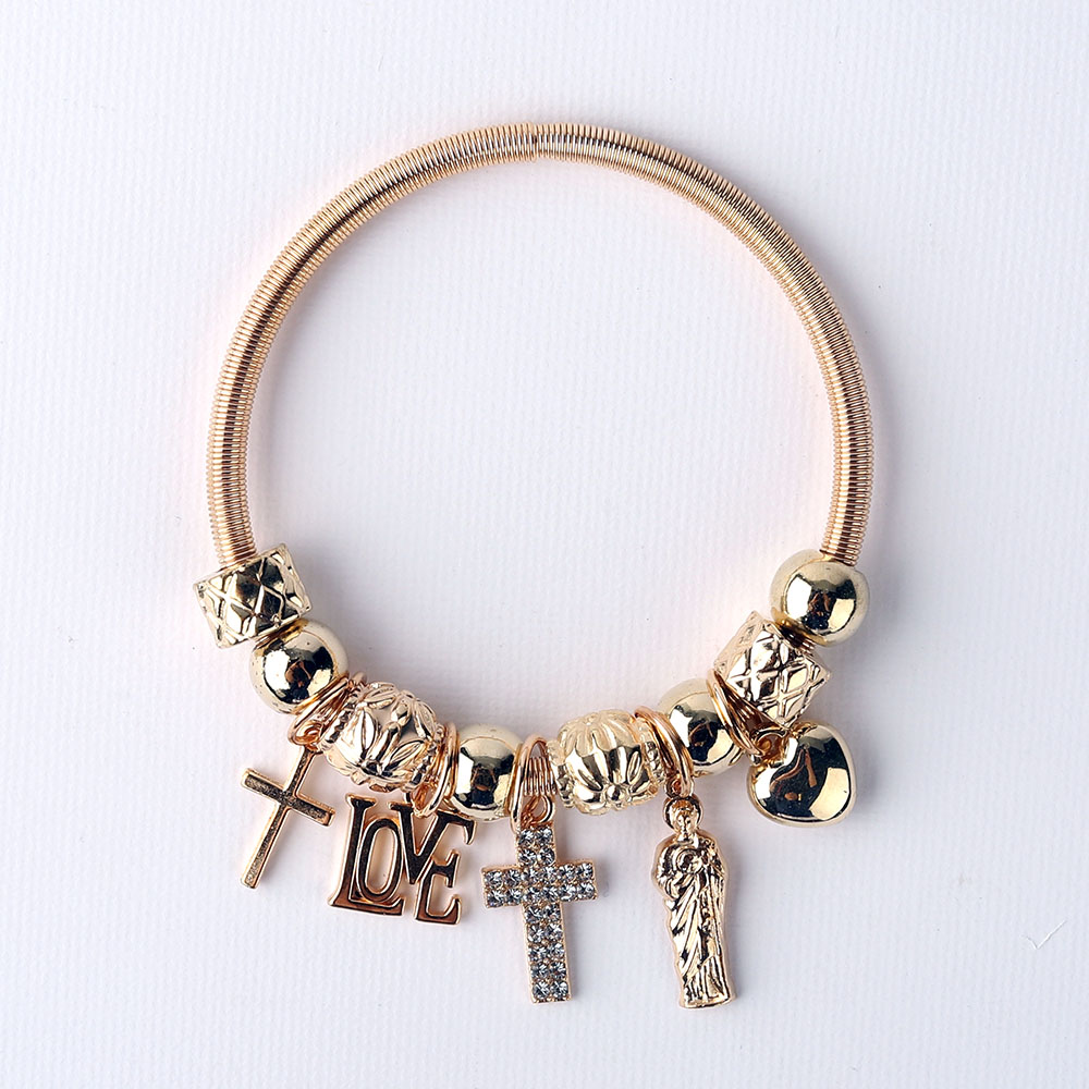 Pulsera con dije en tono dorado